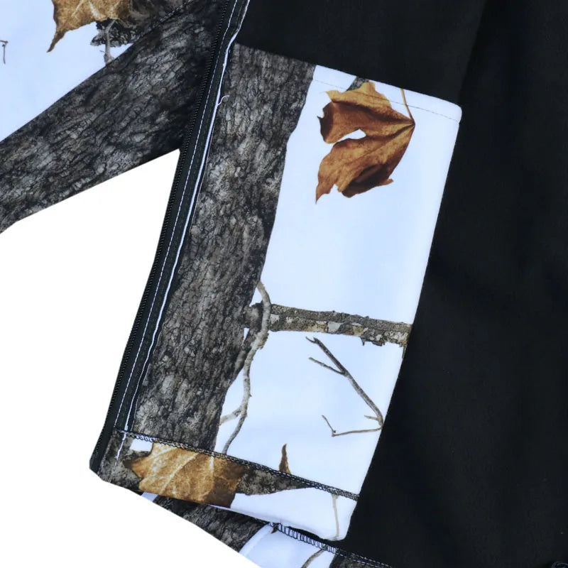 veste de chasse softshell à motif neige et protection imperméable